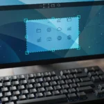 Windows desktop with snipping capture overlay highlighting a screen region and keyboard in foreground